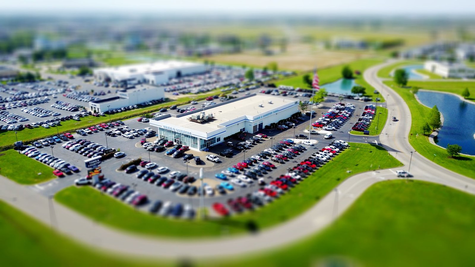 Parque de automóveis — sourcing de stock para stand